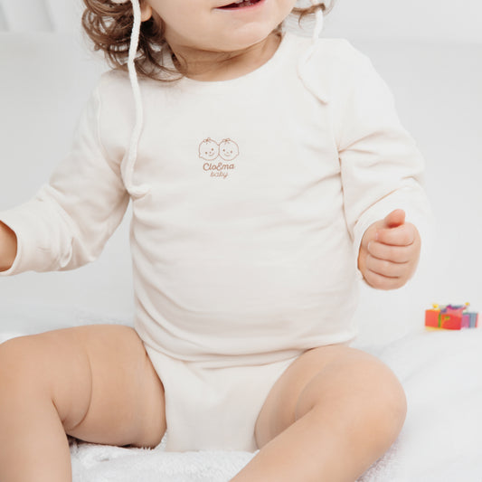 Body Cloé para bebé, algodão orgânico, fecho em velcro, confortável e fácil de vestir.
